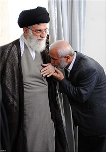 Hamedani_kissing_Khamenei_hand